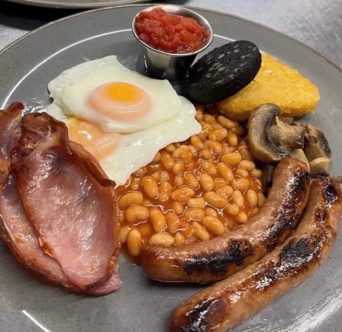 Full English with bacon, sausages, egg, beans, black pudding and mushrooms